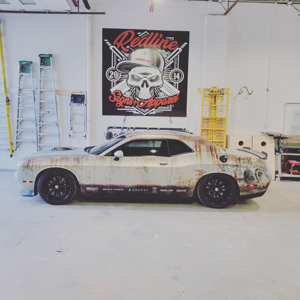 Vehicle wrap work from Redline Signs and Apparel