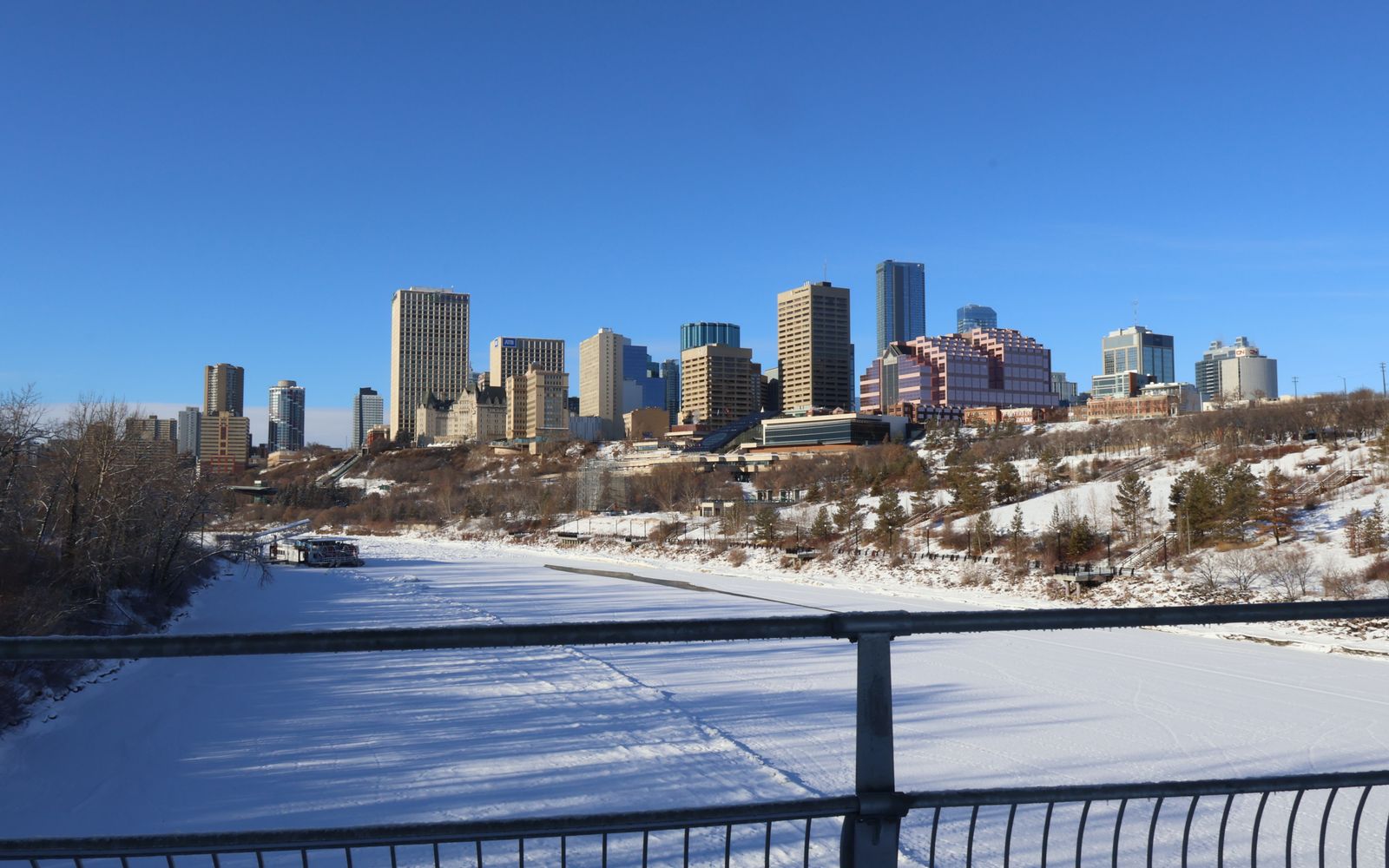 Edmonton skyline above a snow-covered river